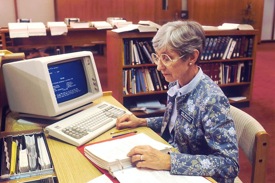 Woman working in a library