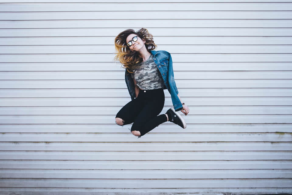 Woman jumping for joy