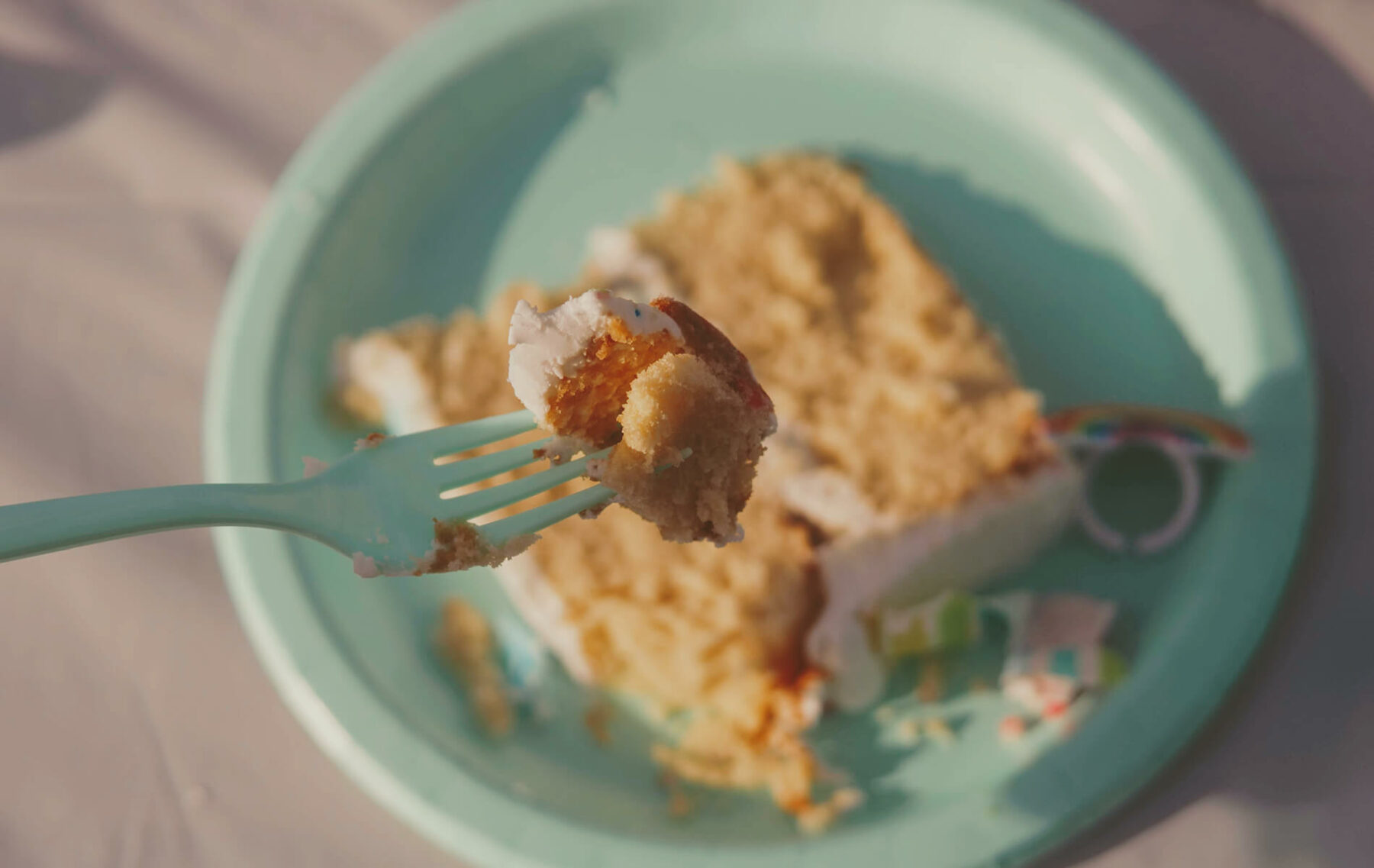 a piece of cake on a plate with a fork.