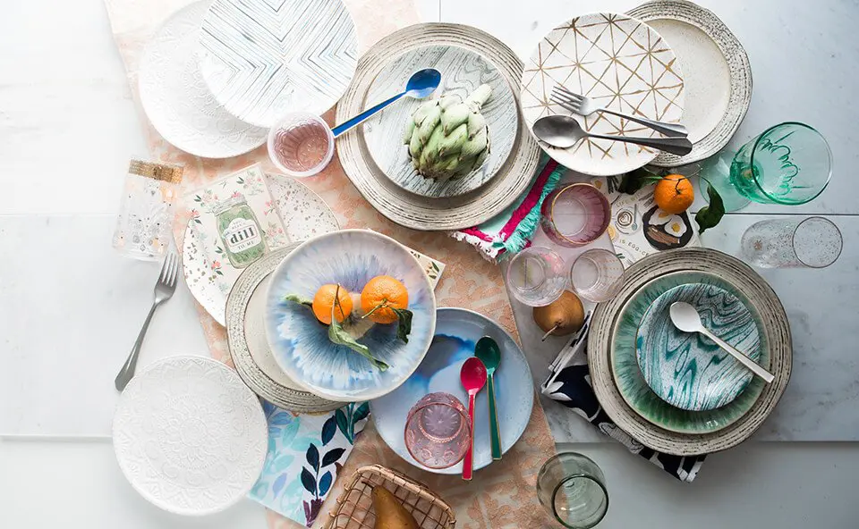 A bunch of empty dishes ready for mindful dish washing