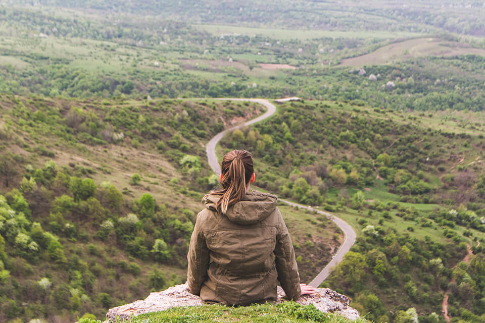 Woman looking at the path ahead of her