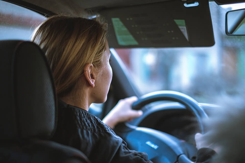 Woman driving a car