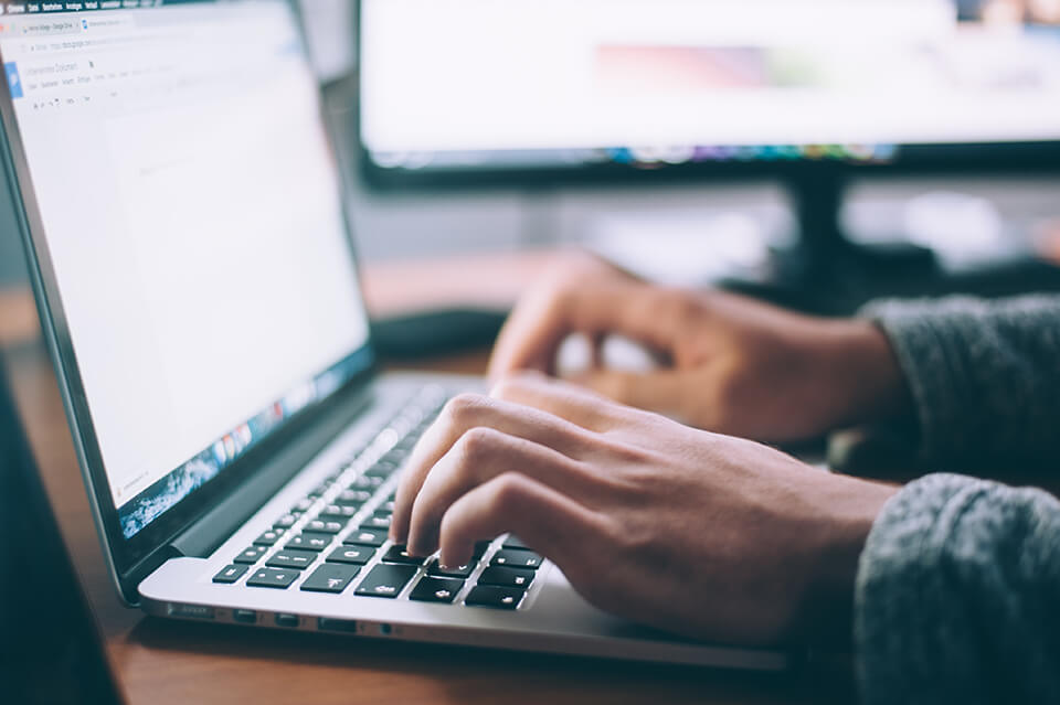 Man working on his laptop computer